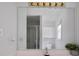 Bathroom with large mirror and view into the shower at 2820 Channing Way, Cumming, GA 30040