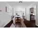 Charming dining area with a large table, stylish chairs, and views into the kitchen at 2820 Channing Way, Cumming, GA 30040