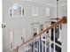 Two story foyer with an arched window and natural light at 2820 Channing Way, Cumming, GA 30040