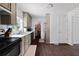 Modern kitchen with stainless appliances, light cabinets, and ample counter space. Includes a pantry at 2820 Channing Way, Cumming, GA 30040