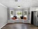 Breakfast nook with bay window and custom bench seating at 30 Court S, Ellenwood, GA 30294