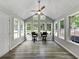 Bright sunroom with large windows, hardwood floors and vaulted ceilings at 30 Court S, Ellenwood, GA 30294