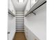 Walk-in closet with custom shelving, rod, and storage drawers at 30 Court S, Ellenwood, GA 30294