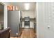 Modern kitchen with stainless steel appliances, granite countertops, and stylish tile backsplash for a contemporary feel at 365 Winding River Dr # E, Atlanta, GA 30350