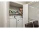Practical laundry room with washer and dryer, offering convenience and functionality for everyday chores at 365 Winding River Dr # E, Atlanta, GA 30350