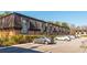 Apartment complex with parking and greenery at 365 Winding River Dr # E, Atlanta, GA 30350