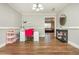 Multipurpose room with hardwood floors, offering flexibility for various uses at 365 Winding River Dr # E, Atlanta, GA 30350