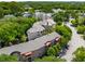 Aerial view of the property surrounded by lush greenery and neighboring buildings at 124 Lafayette Ne Dr # 4, Atlanta, GA 30309