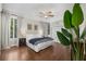 Spacious bedroom featuring hardwood floors, large windows and ceiling fan at 124 Lafayette Ne Dr # 4, Atlanta, GA 30309