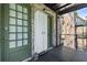 Outdoor hallway with brick walls and doors, features a storage cabinet at 124 Lafayette Ne Dr # 4, Atlanta, GA 30309