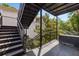 Exterior staircase leading to upper floors with a storage box and railing at 124 Lafayette Ne Dr # 4, Atlanta, GA 30309