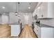 Kitchen featuring granite countertops, stainless steel appliances, and white cabinetry at 48 Paschal St, Temple, GA 30179
