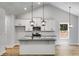 Modern kitchen with granite countertops, stainless steel appliances, and bright lighting at 48 Paschal St, Temple, GA 30179