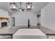 Close-up of a farmhouse sink with granite countertops and stylish light fixtures above at 48 Paschal St, Temple, GA 30179