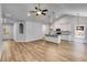 Open concept living area with vaulted ceilings, recessed lighting, and modern kitchen at 48 Paschal St, Temple, GA 30179