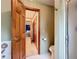 Bathroom with wood trim and door to hallway at 4812 Shallow Creek Nw Dr, Kennesaw, GA 30144