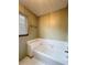 Bathroom with white tiled bathtub and shower combination at 4812 Shallow Creek Nw Dr, Kennesaw, GA 30144
