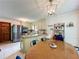 Modern kitchen area with stainless steel fridge, granite counters, and open layout at 4812 Shallow Creek Nw Dr, Kennesaw, GA 30144