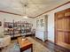 Cozy living room with shelving, a hutch and ample natural light, perfect for relaxing at 4812 Shallow Creek Nw Dr, Kennesaw, GA 30144