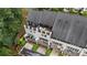 Aerial view of luxury townhomes with rooftop decks and manicured landscaping at 6445 Lucent Ln, Atlanta, GA 30328