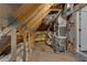 Unfinished attic space featuring HVAC system and exposed beams at 6445 Lucent Ln, Atlanta, GA 30328