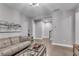 Modern living room with gray walls, wood floors, and contemporary decor at 6445 Lucent Ln, Atlanta, GA 30328