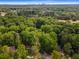 Overhead view of the property showing its proximity to the lush surrounding landscape at 1461 Bubbling Creek Ne Rd, Brookhaven, GA 30319