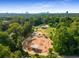 An aerial view of a playground and community recreational area with lush landscaping at 1461 Bubbling Creek Ne Rd, Brookhaven, GA 30319