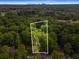 Aerial view of the property and surrounding area with a white property line marked at 1461 Bubbling Creek Ne Rd, Brookhaven, GA 30319