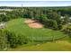 Aerial view of a baseball field at local park, with lush surrounding green trees and scenery at 1461 Bubbling Creek Ne Rd, Brookhaven, GA 30319