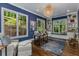 Stylish home office with wood floors, large windows, and custom built-ins at 1461 Bubbling Creek Ne Rd, Brookhaven, GA 30319