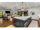 Spacious open floor plan with an island kitchen, dining area, and living room at 1461 Bubbling Creek Ne Rd, Brookhaven, GA 30319