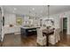 An open concept kitchen featuring an eat-in dining area and an island with barstool seating at 1461 Bubbling Creek Ne Rd, Brookhaven, GA 30319