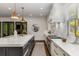 Bright kitchen with island, stainless appliances, and view of backyard at 1461 Bubbling Creek Ne Rd, Brookhaven, GA 30319