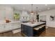 Bright, modern kitchen with a large center island, stainless steel appliances, and ample storage space at 1461 Bubbling Creek Ne Rd, Brookhaven, GA 30319
