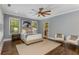 Serene main bedroom with neutral colors, plush carpet, and natural light at 1461 Bubbling Creek Ne Rd, Brookhaven, GA 30319