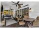 Spacious screened porch with a swing bed, ample seating and wooded views at 1461 Bubbling Creek Ne Rd, Brookhaven, GA 30319