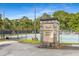 Blackburn Tennis Center entrance featuring well-maintained courts and beautiful landscaping at 1461 Bubbling Creek Ne Rd, Brookhaven, GA 30319