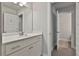 Bathroom featuring white cabinets and neutral wall paint at 33 Vinery Ct, Sharpsburg, GA 30277