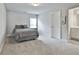 Bedroom with a bed, window, and decor at 33 Vinery Ct, Sharpsburg, GA 30277