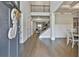 Grand entryway with hardwood floors and a view of the staircase at 33 Vinery Ct, Sharpsburg, GA 30277