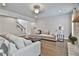 Living room with hardwood floors and open view of the staircase at 33 Vinery Ct, Sharpsburg, GA 30277