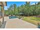 Backyard oasis with a sleek pool, lounge chairs, and a manicured lawn, perfect for summer relaxation and entertainment at 33 Vinery Ct, Sharpsburg, GA 30277