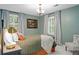 Comfortable bedroom featuring a queen bed, soft lighting, and stylish decor at 5545 Cross Gate Ct, Atlanta, GA 30327