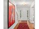 Bright entryway with hardwood floors and art at 5545 Cross Gate Ct, Atlanta, GA 30327
