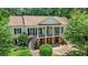 Elevated view of home with columns and manicured greenery at 5545 Cross Gate Ct, Atlanta, GA 30327