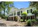 Stately white home with columns, a dual staircase, and black shutters at 5545 Cross Gate Ct, Atlanta, GA 30327