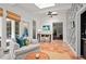 Inviting living room features cozy seating, abundant natural light, and a unique accent wall at 5545 Cross Gate Ct, Atlanta, GA 30327