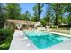Stunning backyard with a large pool, patio area, and ample space for outdoor activities at 5545 Cross Gate Ct, Atlanta, GA 30327