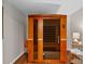 Relaxing home sauna featuring wood construction and glass doors, creating a spa-like experience at 5545 Cross Gate Ct, Atlanta, GA 30327
